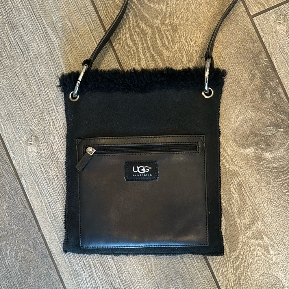 Ugg crossbody bag with strap.